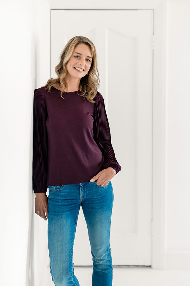 Portrait of Anne Schady, smiling